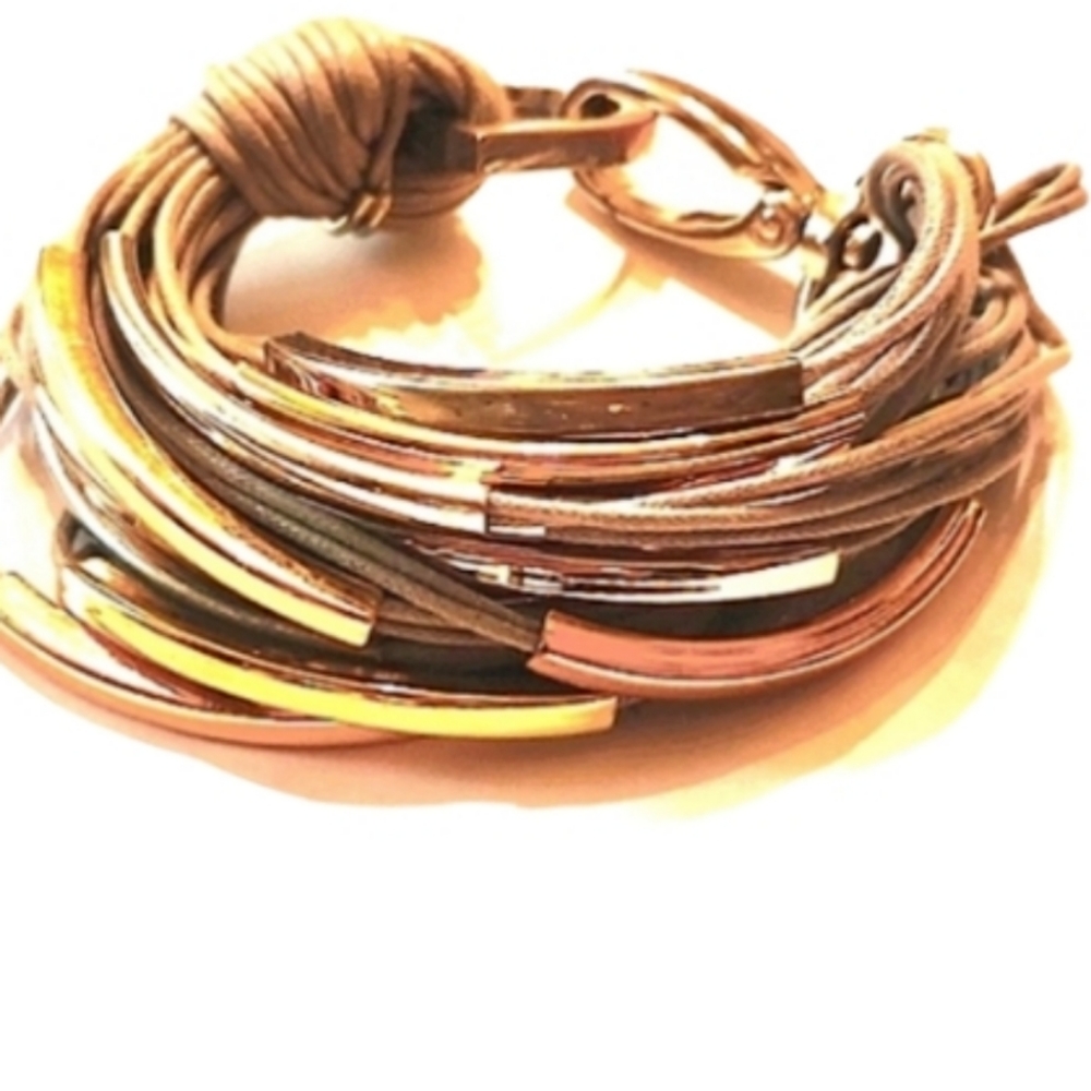 Fun layered cord bracelet. Silver & gold on grey vintage
